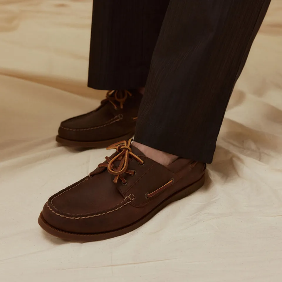 Sperry boat shoe worn with rolled trousers